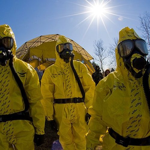Hazardous material decontamination operators await the arrival of contaminated patients of a mock nuclear attack during  Operation Vibrant Response. Muscatatuck Urban Training Center is the Army’s premier urban warfare training site in Butlerville Indiana.  (DoD photo by Benjamin Faske)