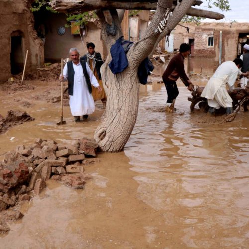 People salvage items from a house destroyed by flood in Enjil district of Herat province, Afghanistan March 29, 2019. Picture taken March 29, 2019.REUTERS/Jalil Ahmad