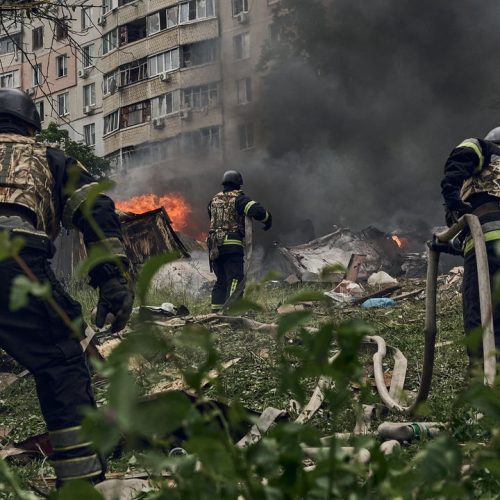KHARKIV, UKRAINE - MAY 14: Emergency services fight a fire following a Russian air strike on May 14, 2024 near Kharkiv, Ukraine. Around 16:00hrs on May 14, the Russian military hit Kharkiv with UMPB D-30 guided air bombs. In recent days Russian forces have gained ground around the Kharkiv region, which Ukraine had largely reclaimed in the months following Russia's initial large-scale invasion in February 2022. The Russians intensified their attacks on Kharkiv in order to force the city's residents to leave, said the city's mayor, Ihor Terekhov. (Photo by Vlada Liberova/Libkos/Getty Images) *** BESTPIX ***