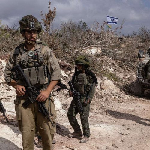 PHOTO TAKEN DURING A CONTROLLED EMBED TOUR WITH THE ISRAELI ARMY AND SUBSEQUENTLY EDITED UNDER MILITARY SUPERVISION -- This picture taken on October 13, 2024 during a controlled embed organised by the Israeli military, shows Israeli troops patrolling in the southern Lebanon's Naqoura region near the border. (Photo by Menahem KAHANA / AFP) (Photo by MENAHEM KAHANA/AFP via Getty Images)