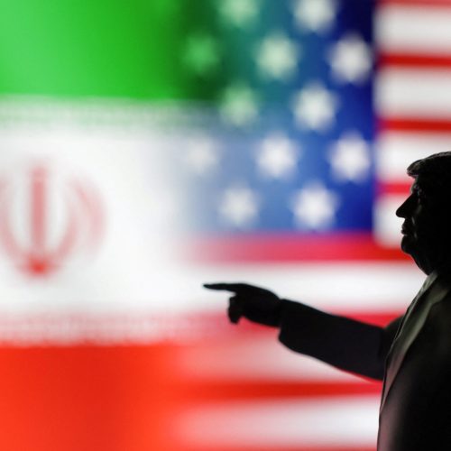 A 3D-printed miniature model depicting U.S. President Donald Trump, Iranian and U.S. flags in this illustration taken,  April 17, 2025. REUTERS/Dado Ruvic/Illustration
