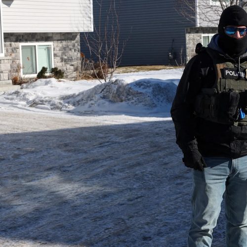 Federal agents with U.S. Immigration and Customs Enforcement (ICE) conduct an immigration enforcement operation in Pine Grove, Minnesota, U.S., January 28, 2026. REUTERS/Shannon Stapleton