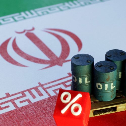 FILE PHOTO: Iranian flag and 3D printed oil barrels miniature are seen in this illustration taken June 23, 2025. REUTERS/Dado Ruvic/Illustration/File Photo