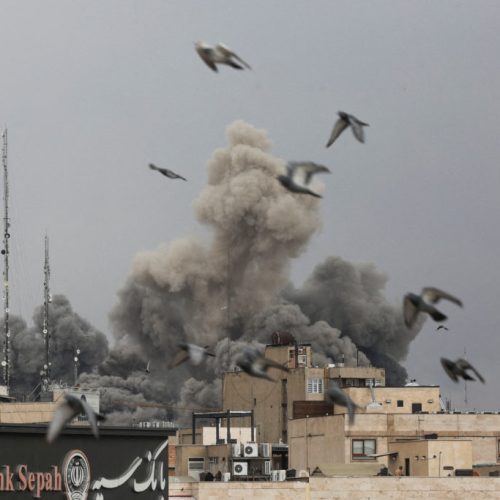Birds fly as smoke rises following an explosion, after Israel and the U.S. launched strikes on Iran, amid the U.S.-Israel conflict with Iran, in Tehran, Iran, March 2, 2026. Majid Asgaripour/WANA (West Asia News Agency) via REUTERS ATTENTION EDITORS - THIS PICTURE WAS PROVIDED BY A THIRD PARTY     TPX IMAGES OF THE DAY