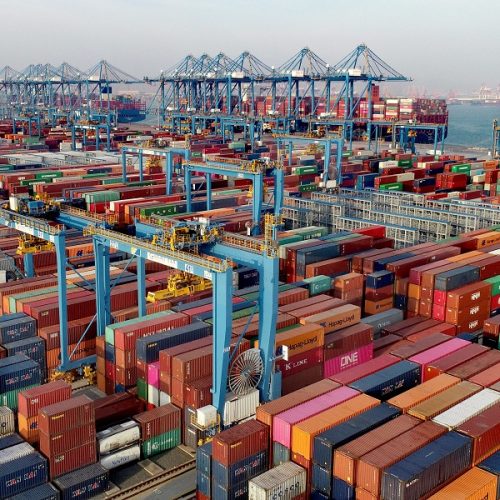 epa08867889 A view of a busy container port in Qingdao, Shandong province, China, 01 December 2020 (issued 07 December 2020). China's exports in November jumped by 21.1 percent by US dollar value from a year earlier, with exports to the United States rose 46 percent to make a record 75.4 billion US dollar trade surplus with the US.  EPA/ZHANG JINGANG CHINA OUT
