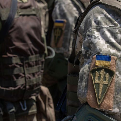 Ukrainian soldiers stand in formation during the closing ceremony of Agile Spirit 19 at Orpholo Training Area, Georgia, Aug. 9, 2019. AgS19 is a joint, multinational exercise co-led by the Georgian Defense Forces and U.S. Army Europe. Approximately 3,300 military personnel from 14 ally and partner nations participated in this theater security cooperation exercise. The brigade-level exercise incorporated a command-post exercise, field-training exercise and live fires. AgS19 occurred at three training locations in Georgia - Senaki Air Base, Vaziani and Orpholo Training Areas. (U.S. Army photo by Pfc. Laurie Ellen Schubert, 5th Mobile Public Affairs Detachment)