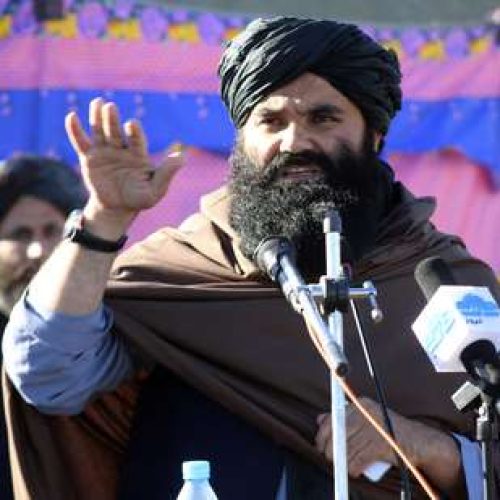 FILE - Acting interior minister Sirajuddin Haqqani, speaks during the funeral prayers of Khalil Haqqani, the minister for refugees and repatriation, during his funeral procession in eastern Paktia province, Afghanistan, Dec. 12, 2024. (AP Photo/Saifullah Zahir, File)
