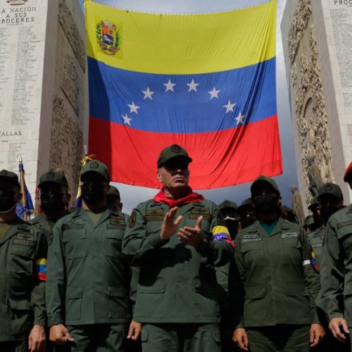 Defense Minister Vladimir Padrino Lopez (C) participates in the march to commemorate the 30th anniversary of February 4, 1992, in Caracas, Venezuela on February 04, 2022. (Photo by Javier Campos/NurPhoto) (Photo by Javier Campos / NurPhoto via AFP)