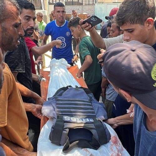 Mourners carry the body Palestinian cameraman Hussam al-Masri, who was a contractor for Reuters, after he was killed along with other journalists and people in Israeli strikes on Nasser hospital, in Khan Younis in the southern Gaza Strip, August 25, 2025. (Photo: Reuters/Stringer)