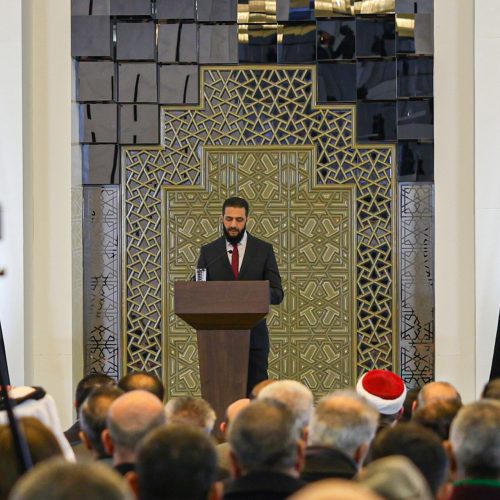 epaselect epa11924145 Syrian interim President Ahmed al-Sharaa delivers a speech during the Syrian National Dialogue Conference in Damascus, Syria, 25 February 2025. The conference, which aims to approve recommendations related to the foundations of the country's upcoming transitional phase, kicked off with the participation of hundreds of figures representing the spectrum of Syrian society.  EPA/MOHAMMED AL RIFAI