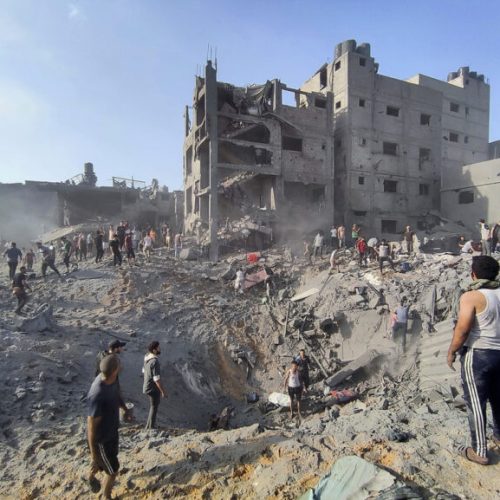 FILE - Palestinians inspect the damage of buildings destroyed by Israeli airstrikes on Jabaliya refugee camp on the outskirts of Gaza City on Oct. 31, 2023. Weeks after ordering northern Gaza's 1.1 million inhabitants to evacuate south, the Israeli army is intensifying its bombing of the area that stretches to the wetlands of Wadi Gaza. Israeli soldiers are also battling Hamas militants just north of Gaza City. It's the start of what officials expect to be a long and bloody invasion that has already pinned down hundreds of thousands of Palestinians who remain in the north. (AP Photo/Abdul Qader Sabbah, File)