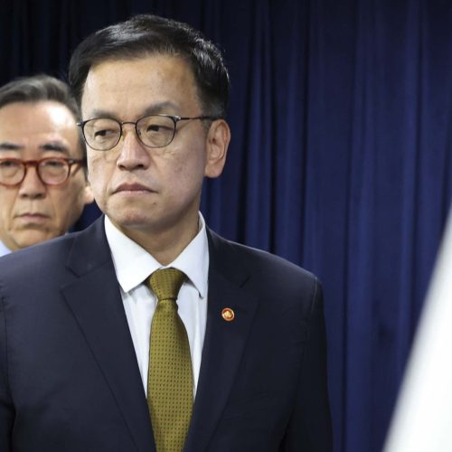 Choi Sang-mok, South Korean deputy Prime Minister and Minister of Economy and Finance, arrives to hold a press conference at the government complex building in Seoul, South Korea, Friday, Dec. 27, 2024. (Bae Hoon-shick/Newsis via AP)