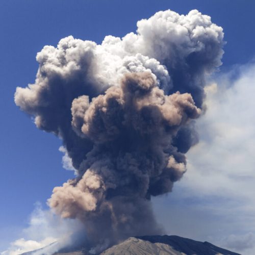 Smoke billows from Mount Etna volcano, Italy, Monday, June 2, 2025. (AP Photo/Giuseppe Distefano)