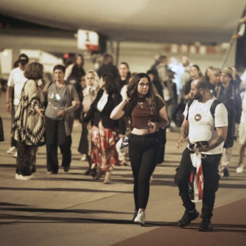 The first group of Bulgarian citizens evacuated from Israel, along with dozens of foreign nationals from Slovenia, the U.S., Belgium, Albania, Kosovo and Romania, arrive at Vassil Levsky airport in Sofia, Wednesday, June 18, 2025. (AP Photo/Valentina Petrova)