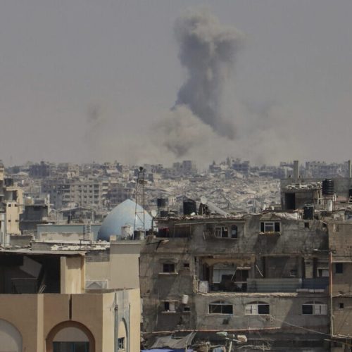 Smoke rises to the sky following an Israeli military strike in Khan Younis, in the Gaza Strip, Thursday, Aug. 21, 2025. (AP Photo/Mariam Dagga)