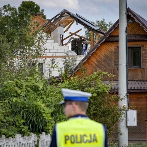 Police and army inspect damage to a house destroyed by debris from a shot down Russian drone in the village of Wyryki-Wola, eastern Poland, on September 10, 2025. NATO air defences helped counter drones that entered Polish airspace overnight and alliance chief Mark Rutte is in contact with Warsaw, a NATO spokeswoman said Wednesday. Polish Prime Minister Donald Tusk said Wednesday that a violation of Polish airspace by several Russian drones overnight was a major provocation aimed at the EU and NATO member. (Photo by Wojtek RADWANSKI / AFP) (Photo by WOJTEK RADWANSKI/AFP via Getty Images)