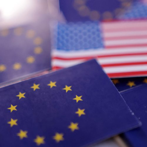 U.S. and European Union flags are seen in this illustration taken March 20, 2025. REUTERS/Dado Ruvic/Illustration/File Photo