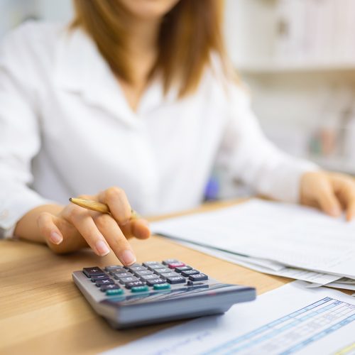 Financial auditor analyzing company financial report concept of accounting, accountancy and tax form