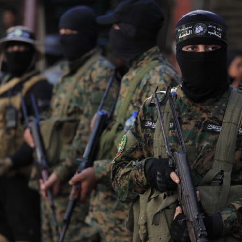 Hamas fighters attend the funeral procession of a Hamas official Samer al-Haj who was killed on Friday by an Israeli drone strike, at Ein el-Hilweh Palestinian refugee camp, in the southern port city of Sidon, Saturday, Aug. 10, 2024. (AP Photo/Mohammed Zaatari)
