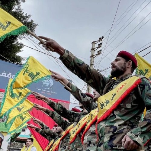 Fighters of the Lebanese Shiite group Hezbollah parade during a ceremony to commemorate the party's fallen leaders in the Lebanese village of Jibshit, about 50 kilometres south of the capital Beirut on February 15, 2024. (Photo by MAHMOUD ZAYYAT / AFP)
