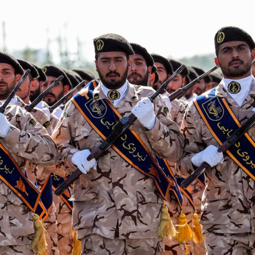 Members of Iran's Revolutionary Guards Corps (IRGC) march during the annual military parade marking the anniversary of the outbreak of the devastating 1980-1988 war with Saddam Hussein's Iraq, in the capital Tehran on September 22, 2018. - In Iran's southwestern city of Ahvaz during commemoration of the same event, dozens of people were killed with dozens others wounded in an attack targeting another army parade, state media reported on September 22. (Photo by AFP)