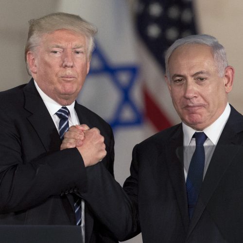 FILE - In this Tuesday, May 23, 2017, file photo, Israeli Prime Minister Benjamin Netanyahu, right, and US President Donald Trump shake hands at the Israel Museum in Jerusalem. (AP Photo/Sebastian Scheiner, File)