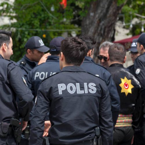 Istanbul, Turkey - May 09 2019: Group of policemen (Polis) discussing the street.