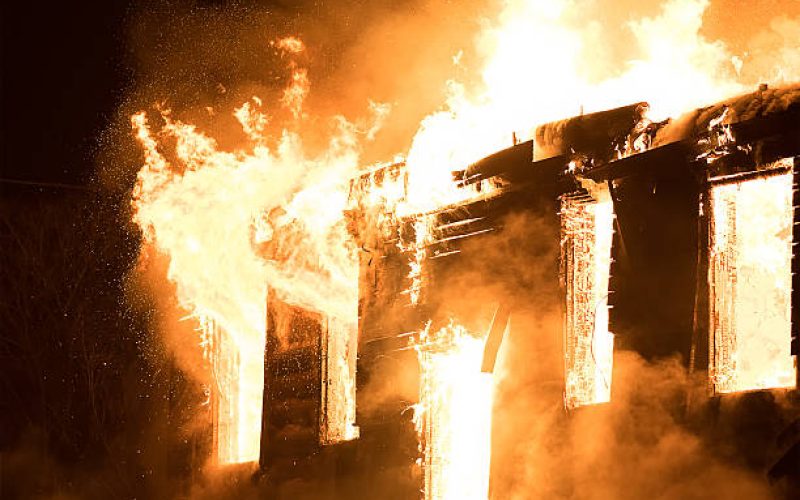 Photo of Huge Flame Distracting House on Fire. Fire Safety Concept