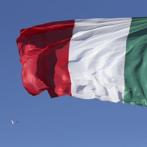 Italian flag waves during a bilateral meeting between Italy and Russia, in Trieste, Italy, Tuesday, Nov. 26, 2013. (AP Photo/Luca Bruno)