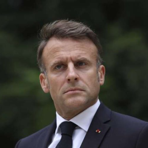 FILE - French President Emmanuel Macron reviews troops that will take part to the Bastille Day parade in Paris, on July 2, 2024. In his first public declaration since Sunday's legislative elections result, French President Emmanuel Macron said Wednesday he will give time to the country's different political parties to build a "Republican" majority at the National Assembly, before he can decide on a Prime Minister. (AP Photo/Aurelien Morissard, Pool, File)