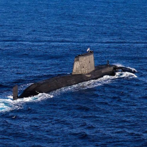 Pictured: An Astute Class Submarine on the surface.United Kingdom Carrier Strike Group 21 (CSG21) consists of multiple vessels from the UK as well as ships from the United States Navy and the Dutch Navy. One of those assets includes an Astute Class Submarine. Whilst operating within the Mediterranean an Astute Class submarine conducted a rare surface; to interact and exercise with HMS Queen Elizabeth and the task group.HMS Queen Elizabeth is the deployed flag ship for CSG21 will see the ship along with the Strike Group work with over 40 countries from around the world. The Strike Group will operate and exercise with other Countries Navies and Air Forces during the 7 month deployment. The Strike Group includes ships from the United States Navy, The Dutch Navy, and Marines from the US Marine Corps. As well as UK Frigates, Destroyers two RFA supply ships and air assets from 617 Sqn, 820 NAS, 815 NAS and 845 NAS. This will be the largest deployment of Fifth Generation Fighter Jets in history.