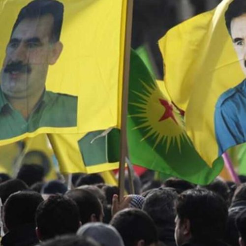 Demonstrators hold flags with portraits of jailed Kurdistan Workers Party (PKK) leader Abdullah Ocalan during a protest in Strasbourg February 18, 2012. Thousands of demonstrators protested in support of Ocalan, who was captured on February 15, 1999, and is currently serving a life sentence in Turkey. REUTERS/Vincent Kessler (FRANCE  - Tags: POLITICS CIVIL UNREST)