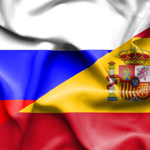 Waving flag of Spain and Russia