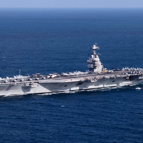 221009-N-TL968-1248 ATLANTIC OCEAN (Oct. 9, 2022) The first-in-class aircraft carrier USS Gerald R. Ford (CVN 78) steams the Atlantic Ocean during a simulated straits transit with the Gerald R. Ford Carrier Strike Group (GRFCSG) in the Atlantic Ocean, Oct. 9, 2022. The Gerald R. Ford Carrier Strike Group is deployed in the Atlantic Ocean, conducting training and operations alongside NATO Allies and partners to enhance integration for future operations and demonstrate the U.S. Navy's commitment to a peaceful, stable and conflict-free Atlantic region. (U.S. Navy photo by Mass Communication Specialist 2nd Class Jackson Adkins)