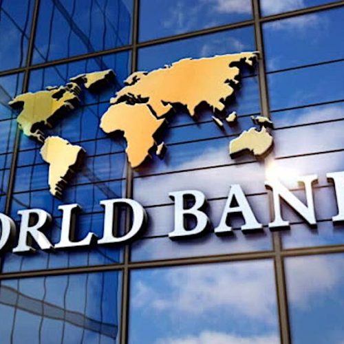 World Bank on glass building. Mirrored sky and city modern facade. Global capital, business, finance, economy, banking and money concept 3D rendering animation.